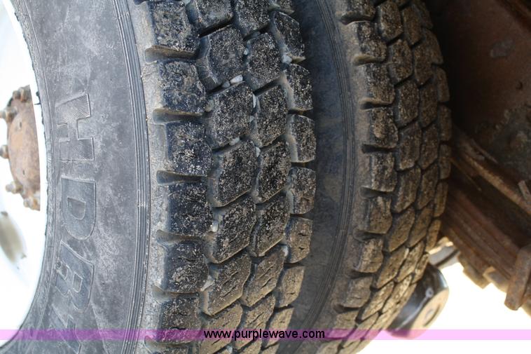 image for item A6986 2000 GMC C8500 flatbed truck