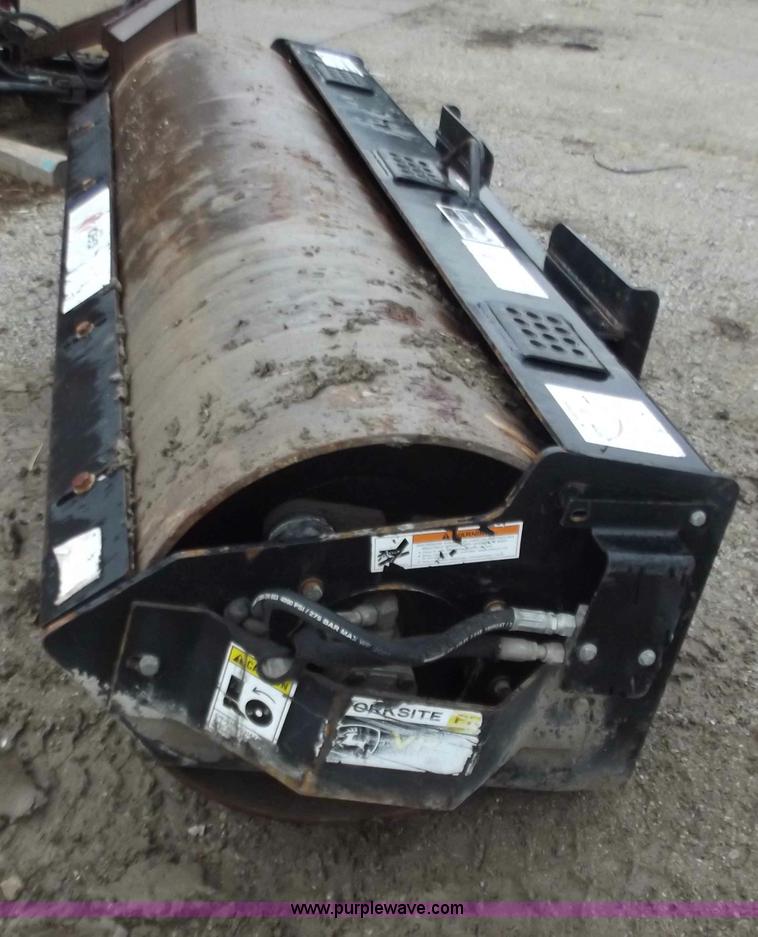 image for item B6224 7' John Deere skid steer vibrating roller