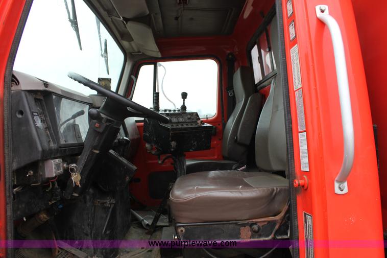 image for item A7160 1999 International 4900 tandem axle dump truck