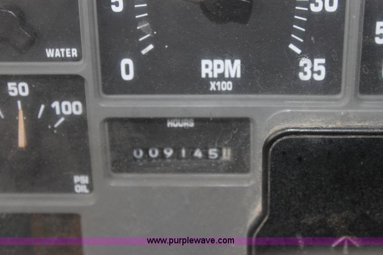 image for item A7160 1999 International 4900 tandem axle dump truck