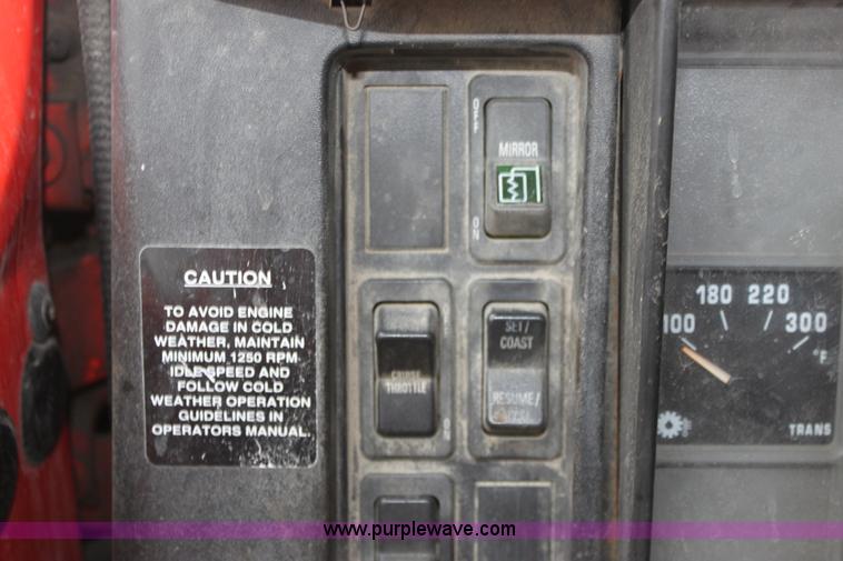 image for item A7160 1999 International 4900 tandem axle dump truck