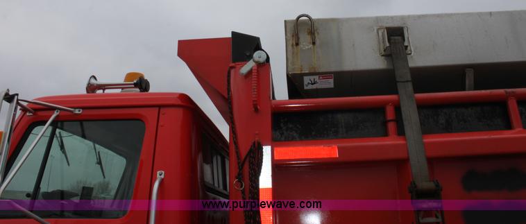 image for item A7160 1999 International 4900 tandem axle dump truck