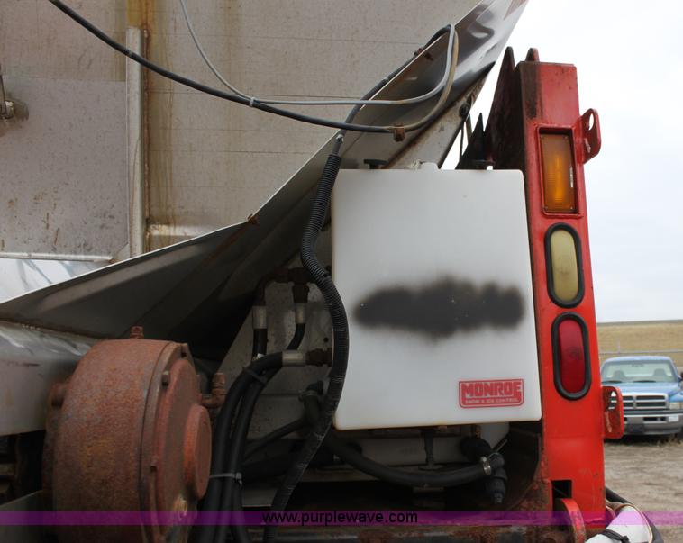 image for item A7160 1999 International 4900 tandem axle dump truck