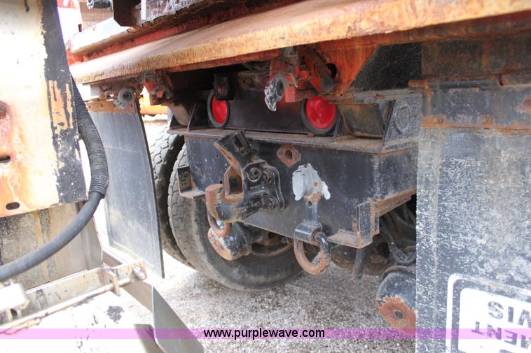 image for item A7160 1999 International 4900 tandem axle dump truck