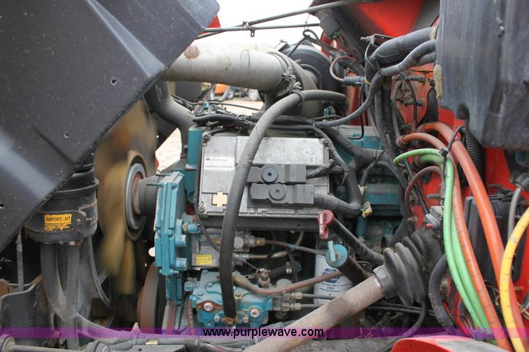 image for item A7160 1999 International 4900 tandem axle dump truck