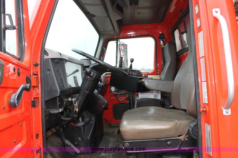 image for item A7161 1999 International 4900 tandem axle dump truck