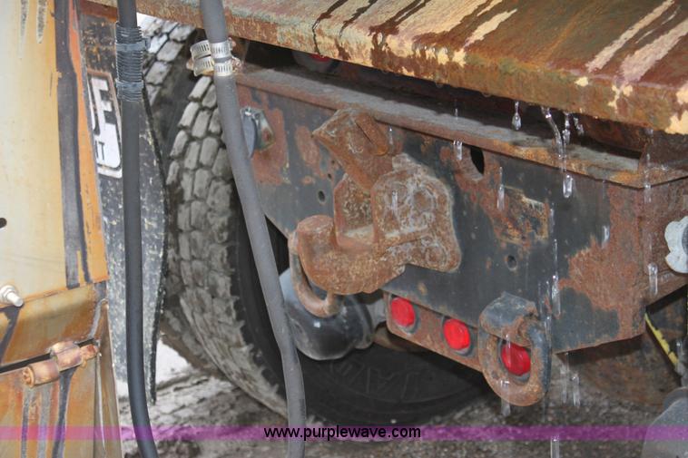 image for item A7162 1999 International 4900 tandem axle dump truck