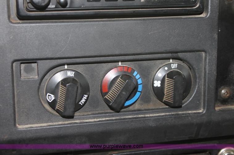 image for item A7162 1999 International 4900 tandem axle dump truck