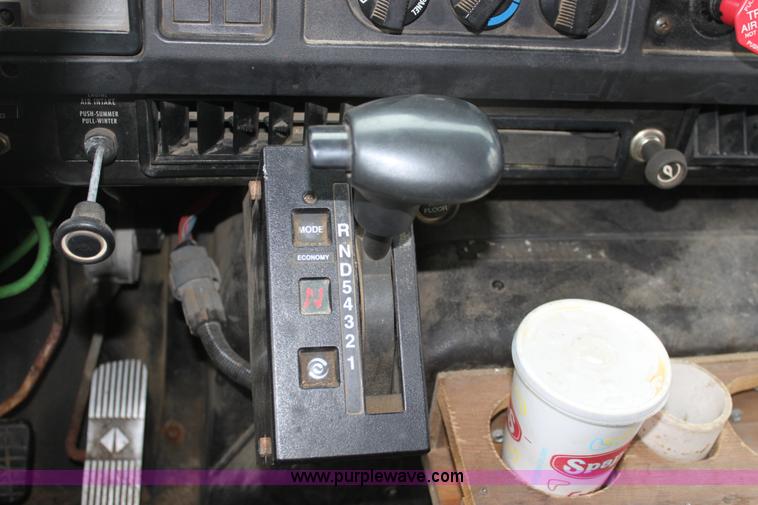 image for item A7162 1999 International 4900 tandem axle dump truck