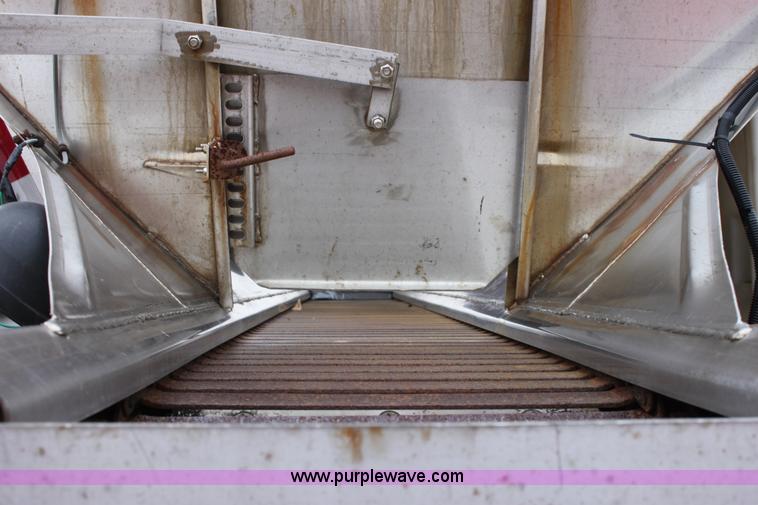 image for item A7162 1999 International 4900 tandem axle dump truck