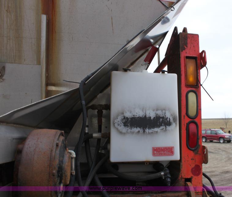 image for item A7162 1999 International 4900 tandem axle dump truck