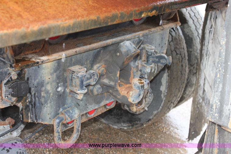 image for item A7163 1999 International 4900 tandem axle dump truck