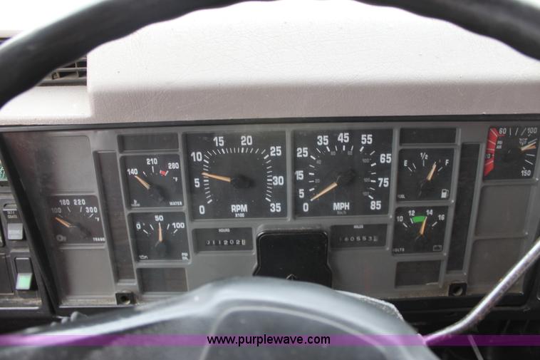 image for item A7163 1999 International 4900 tandem axle dump truck