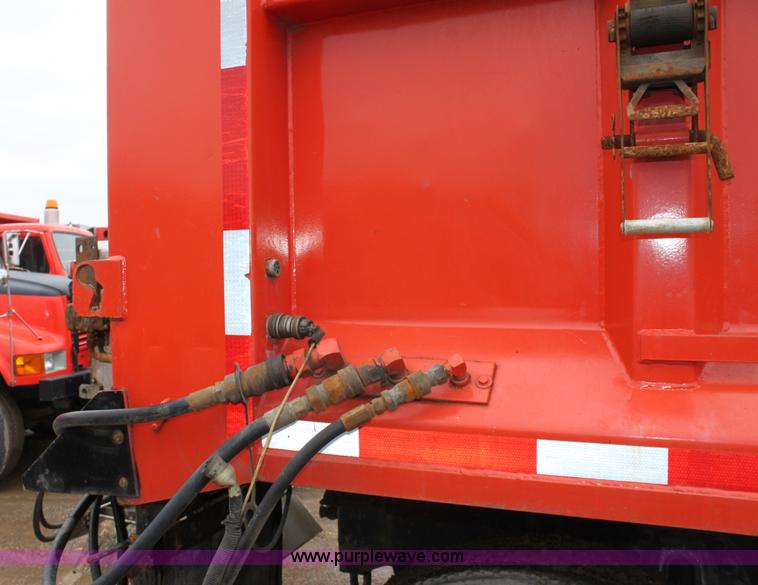 image for item A7163 1999 International 4900 tandem axle dump truck