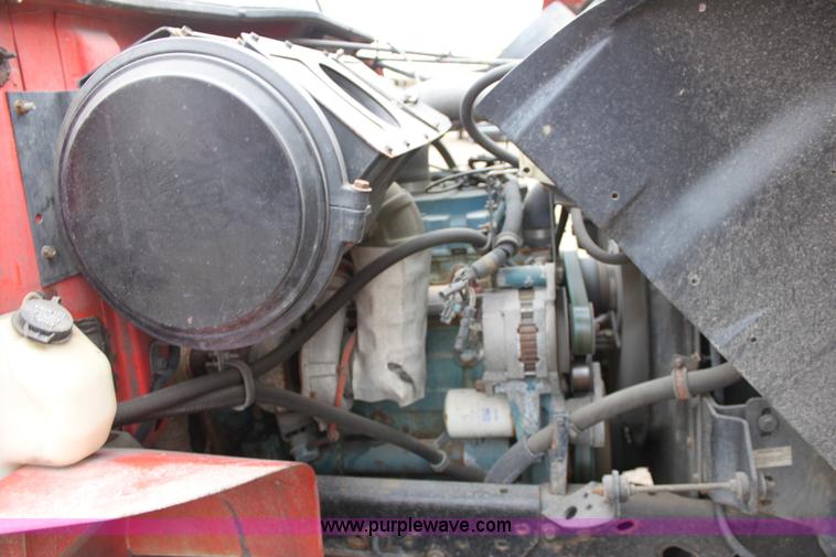 image for item A7163 1999 International 4900 tandem axle dump truck