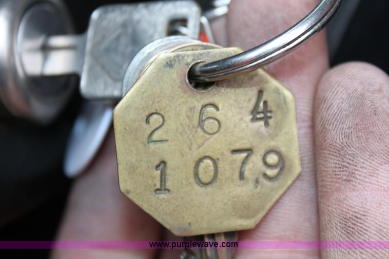 image for item A7163 1999 International 4900 tandem axle dump truck