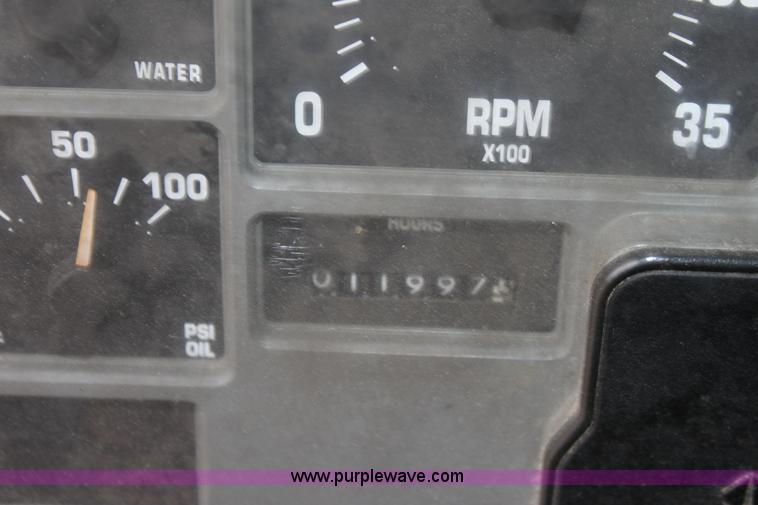 image for item A7164 1999 International 4900 tandem axle dump truck