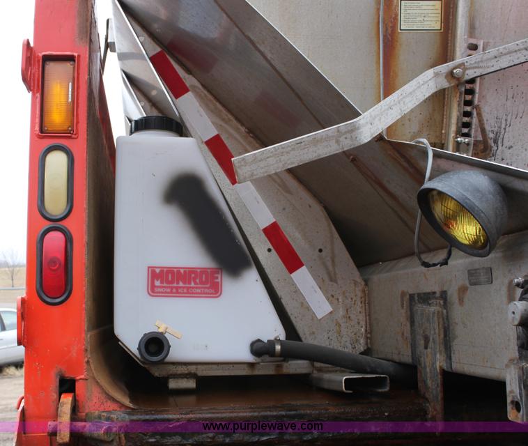 image for item A7164 1999 International 4900 tandem axle dump truck