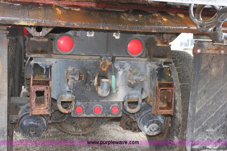 image for item A7164 1999 International 4900 tandem axle dump truck