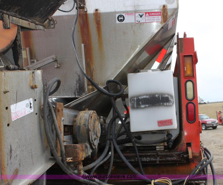 image for item A7164 1999 International 4900 tandem axle dump truck