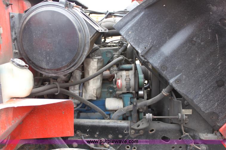 image for item A7164 1999 International 4900 tandem axle dump truck