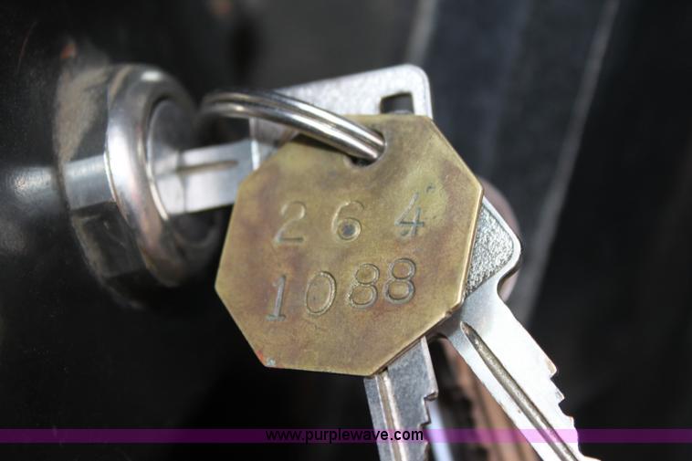 image for item A7164 1999 International 4900 tandem axle dump truck