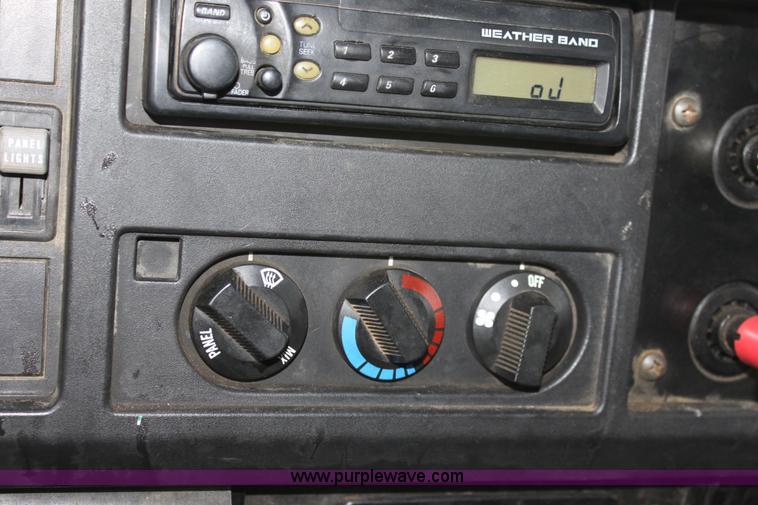 image for item A7165 1999 International 4900 tandem axle dump truck