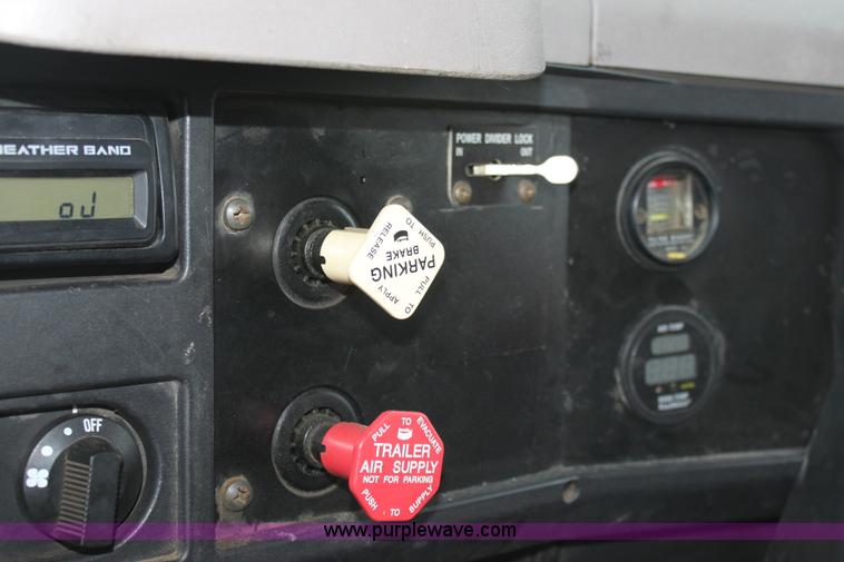 image for item A7165 1999 International 4900 tandem axle dump truck