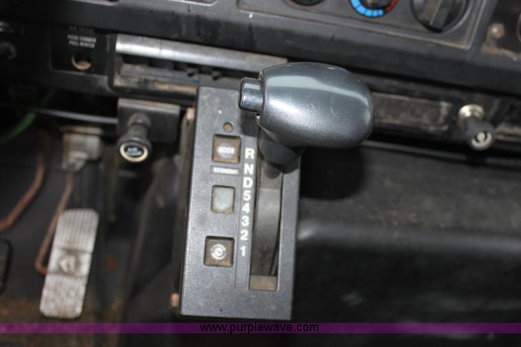 image for item A7165 1999 International 4900 tandem axle dump truck