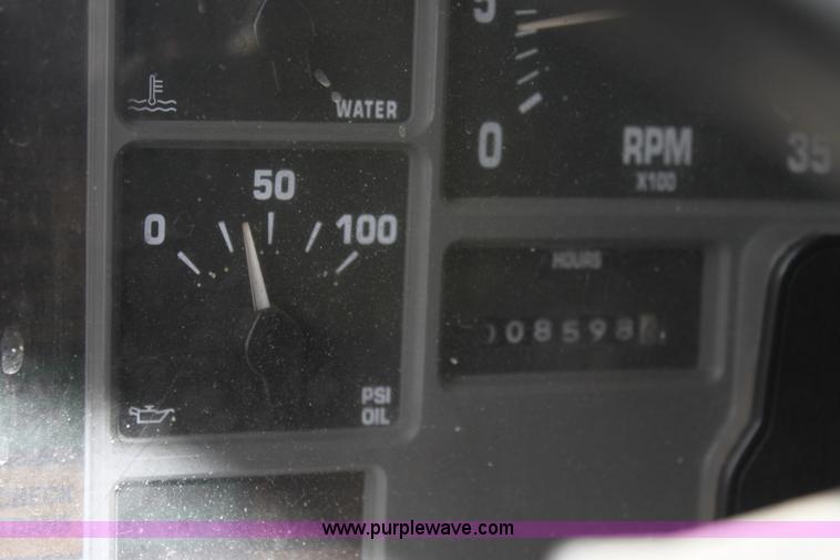 image for item A7165 1999 International 4900 tandem axle dump truck