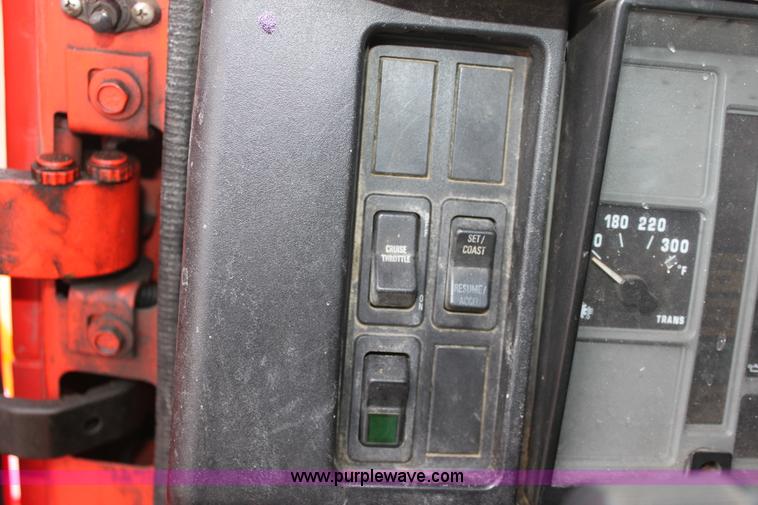 image for item A7165 1999 International 4900 tandem axle dump truck