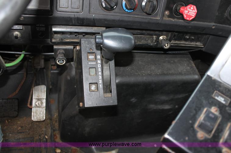 image for item A7165 1999 International 4900 tandem axle dump truck