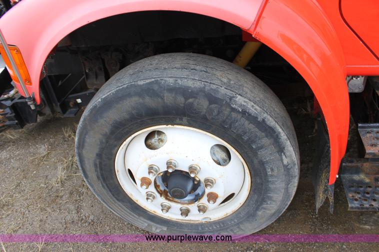 image for item A7165 1999 International 4900 tandem axle dump truck