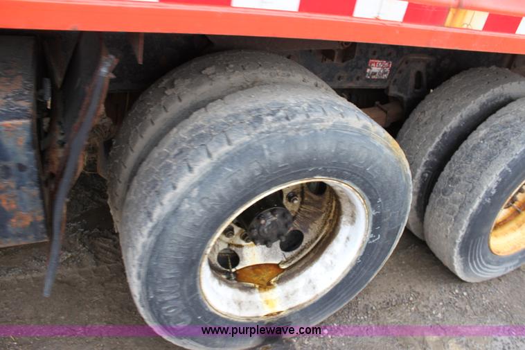 image for item A7165 1999 International 4900 tandem axle dump truck