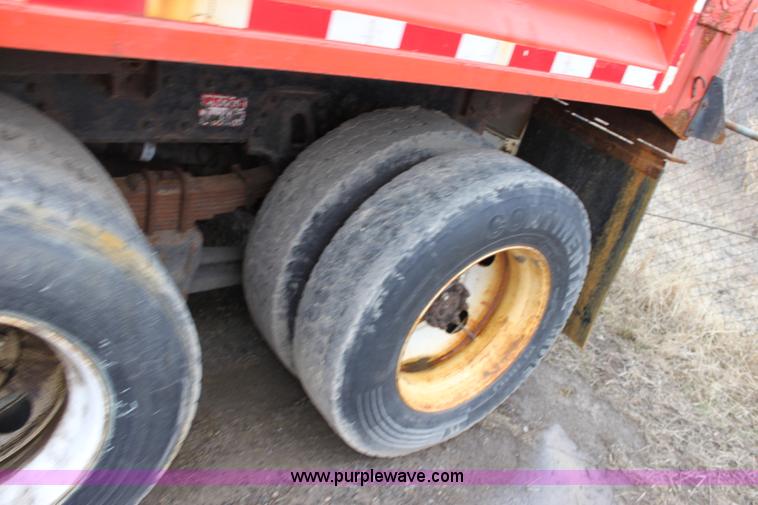 image for item A7165 1999 International 4900 tandem axle dump truck