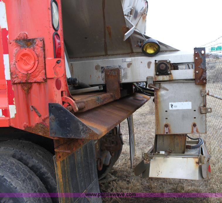 image for item A7165 1999 International 4900 tandem axle dump truck