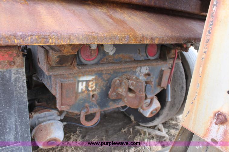 image for item A7165 1999 International 4900 tandem axle dump truck