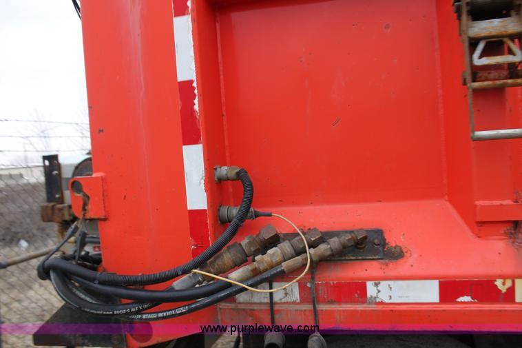 image for item A7165 1999 International 4900 tandem axle dump truck