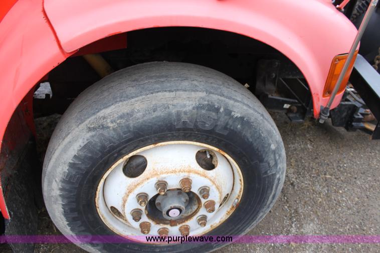 image for item A7165 1999 International 4900 tandem axle dump truck