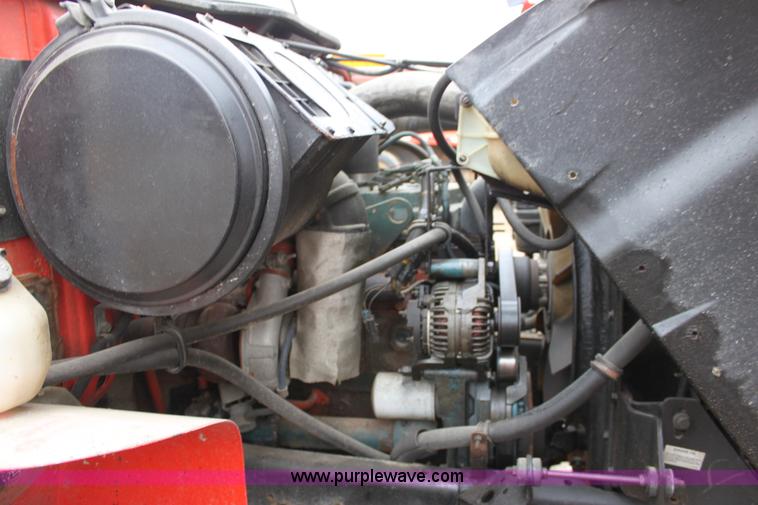 image for item A7165 1999 International 4900 tandem axle dump truck