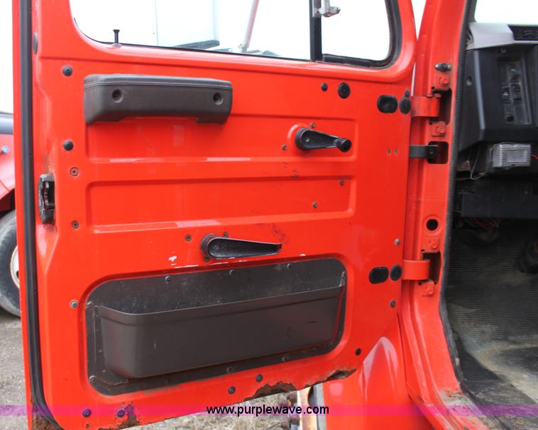 image for item A7166 1999 International 4900 tandem axle dump truck