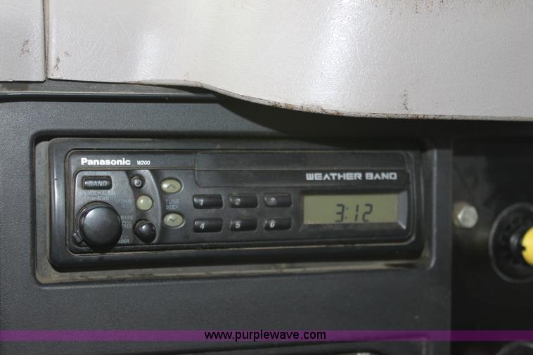 image for item A7166 1999 International 4900 tandem axle dump truck