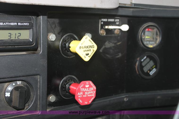 image for item A7166 1999 International 4900 tandem axle dump truck