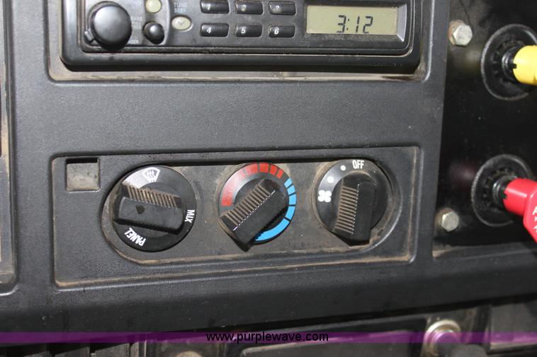 image for item A7166 1999 International 4900 tandem axle dump truck