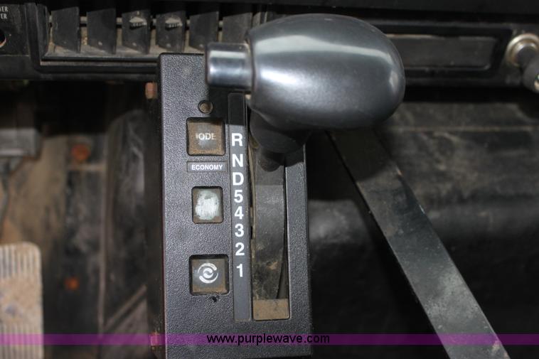 image for item A7166 1999 International 4900 tandem axle dump truck