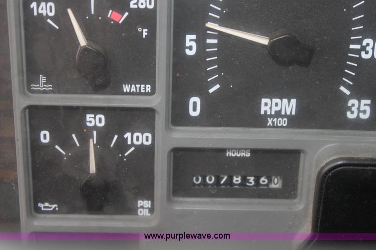 image for item A7166 1999 International 4900 tandem axle dump truck