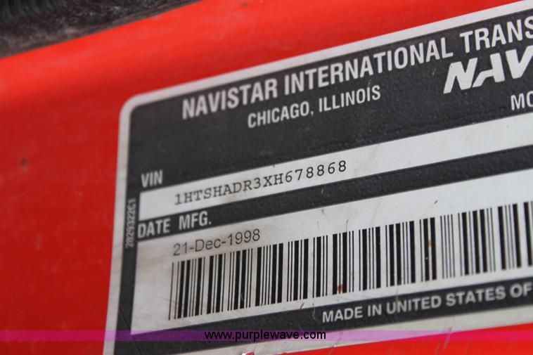 image for item A7166 1999 International 4900 tandem axle dump truck