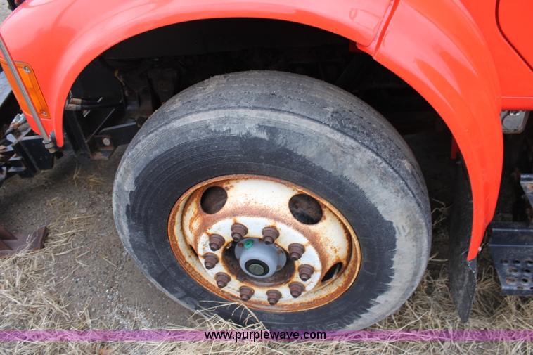 image for item A7166 1999 International 4900 tandem axle dump truck