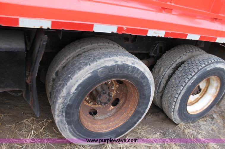 image for item A7166 1999 International 4900 tandem axle dump truck