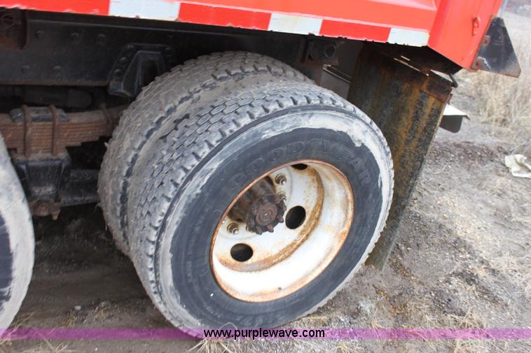 image for item A7166 1999 International 4900 tandem axle dump truck